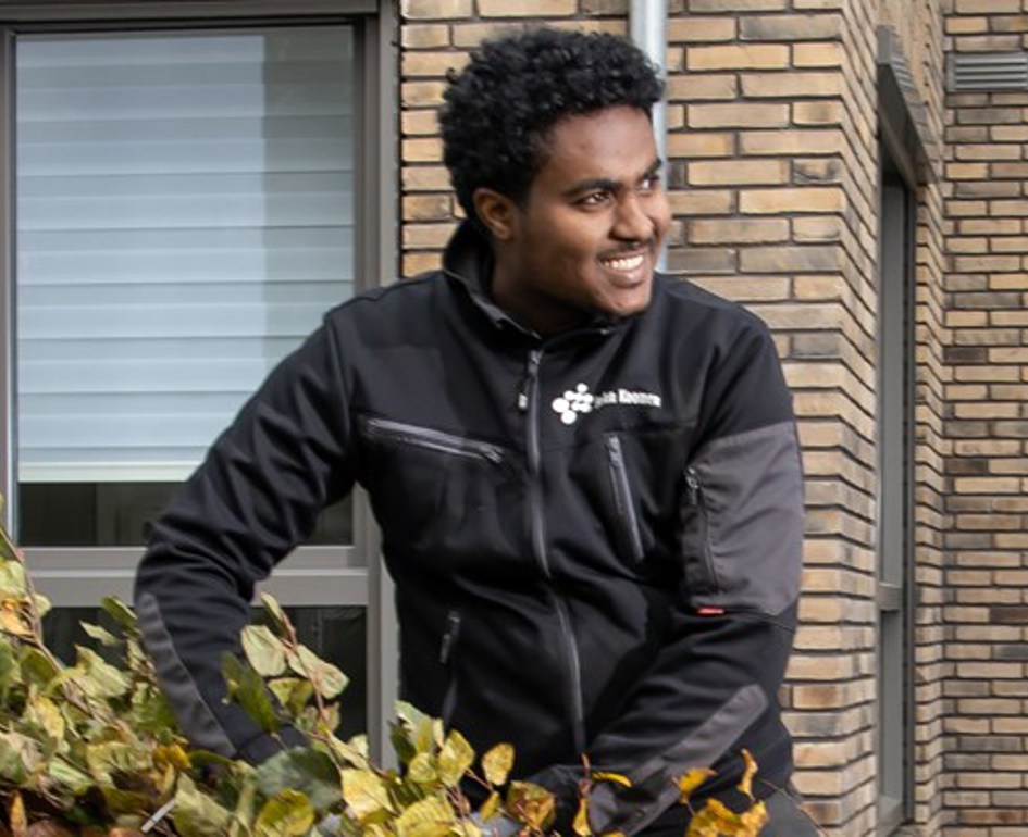 Medewerker Groen Kruiwagen